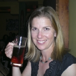 Lisa trying the red beer at Cafe Alvastron