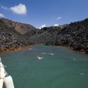 Swimming at the hot springs Nea Kameni