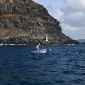 Sam finds a small fishing boat in the Ammoudi harbor