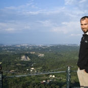 Sam at Kaiser's Throne with a view across Kerkyra to Kerkyra Town in the background