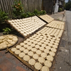 Rice cakes drying in the midday sun