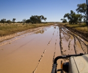 The Tank about to brave one of the deeper mud puddles on the way between Boulia and Bedourie
