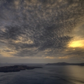 Sunset over Nea Kameni and Thirasia: the quiet before the storm