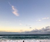 Matt fishing in the surf in front of our house