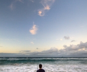 Matt fishing in the surf in front of our house