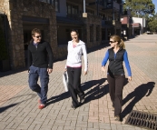 Will, Abi and Lisa walking through Thredbo village