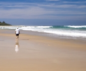 Jacque, Sam, Jarrid and John walking along the beach at Lake Conjola