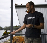 Sam and some friendly Rainbow Lorikeets at Lake Conjola