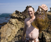 Jarrid with a monster Leatherjacket at Tomakin