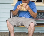 Jarrid enjoying a pie from Tilba Bakery