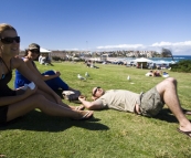 Lisa, Jacque and Jarrid taking it all in on the grass at Bondi