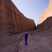 Lisa hiking into one of Kata Tjuta\'s gorges