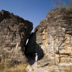 Lisa walking through one of the sandstone crevices along the Bardedjilidji Walk