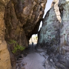 Lisa walking through one of the sandstone crevices along the Bardedjilidji Walk