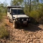 Lisa driving on the track out of Gubara Pools