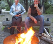 Sam and Lisa by the fire at Conto Campground
