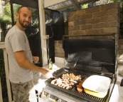 Sam cooking an Aussie breakfast