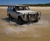 Bessie crossing one of the many freshwater streams flowing into the ocean