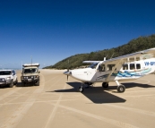 The Tank, Peter and Bessie next to the plane that transports the rangers to and from the island