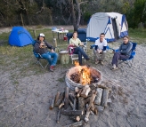 Chris, Lisa, James and Sarah enjoying the fire at Waddy Point