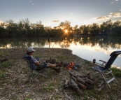 Chris enjoying the sunset on the banks of the Dawson River near Moura