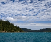 Yachts in for a break at a secluded cove on Whitsunday Island