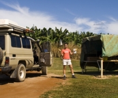 Grabbing some fresh fruit from one of the many roadside stands