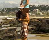 Lisa hitching a ride on Coolum Beach