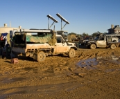 Stranded 4WD vehicles next to the phone booths in Innamincka on Wednesday morning