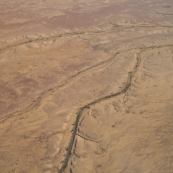 Dry creeks wind their way across The Outback between William Creek and Lake Eyre