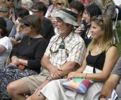 Carol, Greg and Lisa watching the performers at Festivale