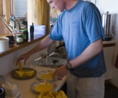 Grant making his famous deep-fried camembert wedges