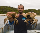 Sam holding  couple of Giant Crab