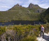 Lisa hiking around Dove Lake with Cradle Mountain in the background