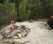 Carol reading at our campsite next to the Lindsay River