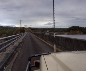 The Tank driving across the massive Reece Dam