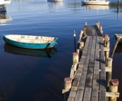 Fishing boats in the morning light in Strahan