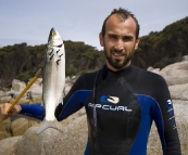 Sam catching Yelloweye Mullet for everyone's dinner at Bay of Fires