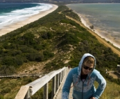 Lisa clambering up the stairs to the lokout on The Neck