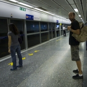 Sam waiting for the MRT (subway)