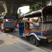 Tuk-tuks line up near King Rama VIII Bridge