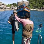 Sam getting in the water at Hin Wong Bay