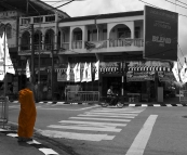 A monk walking the streets of Phuket Town