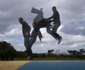 Sam enjoying the air-filled trampoline at Ocean Beach