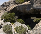 Lisa looking into one of the caves on the way up Frenchman's Peak