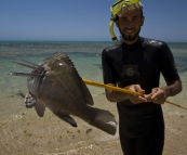 Sam catches Lisa a Yellowfin Bream for dinner on Ningaloo Station
