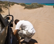 Letting down the tyres on the way to Five Finger Reef