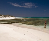 Lisa in the water on a secluded beach at Five Finger Reef