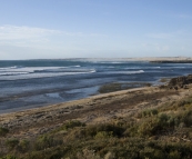 The famous surf breaks of Castles and Caves from the dunes at Cactus Beach