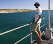 Sam fishing from the jetty at Cape LeHunte